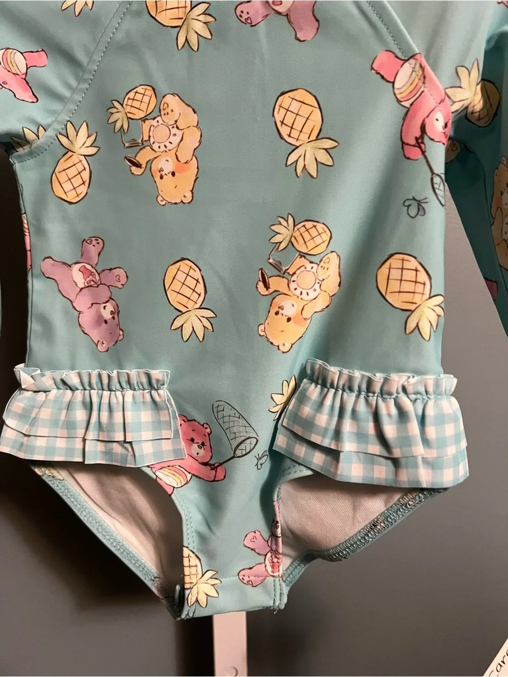 Care Bear Baby Pastel Pineapple & Bear Ruffle UPF 50+ Swimsuit NWT 6-9 months
